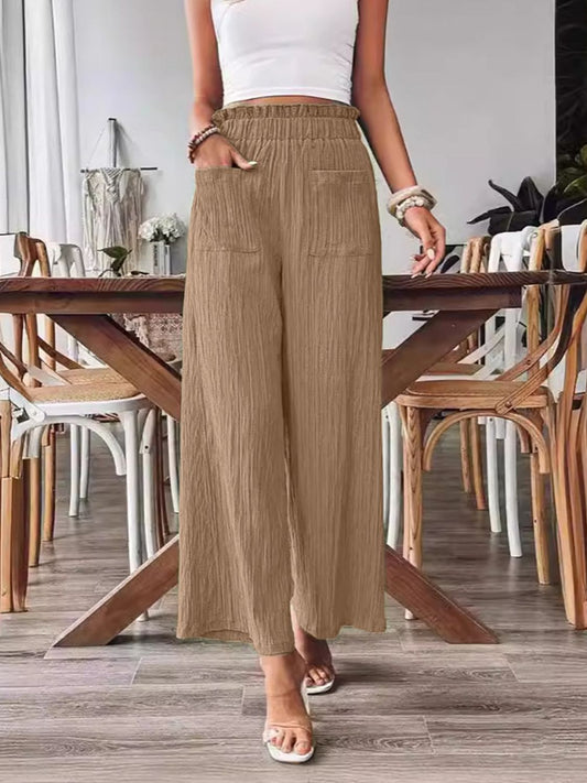 Pantalones anchos con cintura elástica y bolsillos