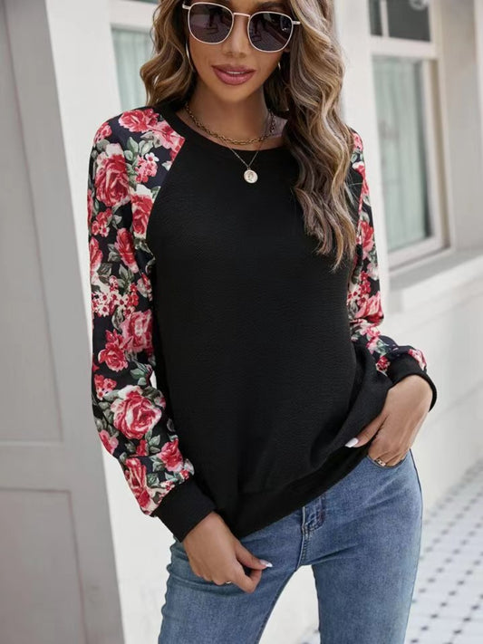 Sudadera con cuello redondo y mangas raglán con estampado floral