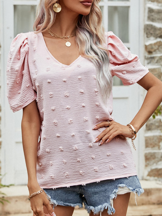 Blusa de manga corta abullonada con lunares suizos