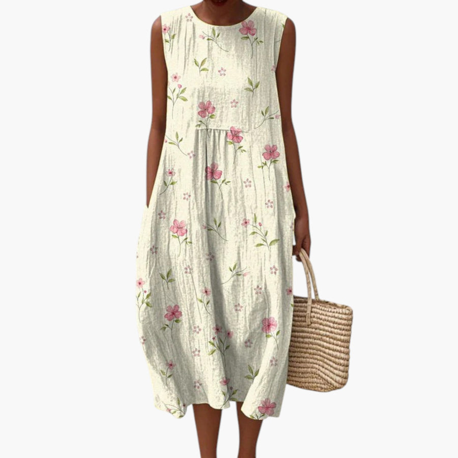 My Store 4 Dawn Blossom midi jurk in crème met roze bloemenprint, mouwloos en gemaakt van luchtige stof op het strand