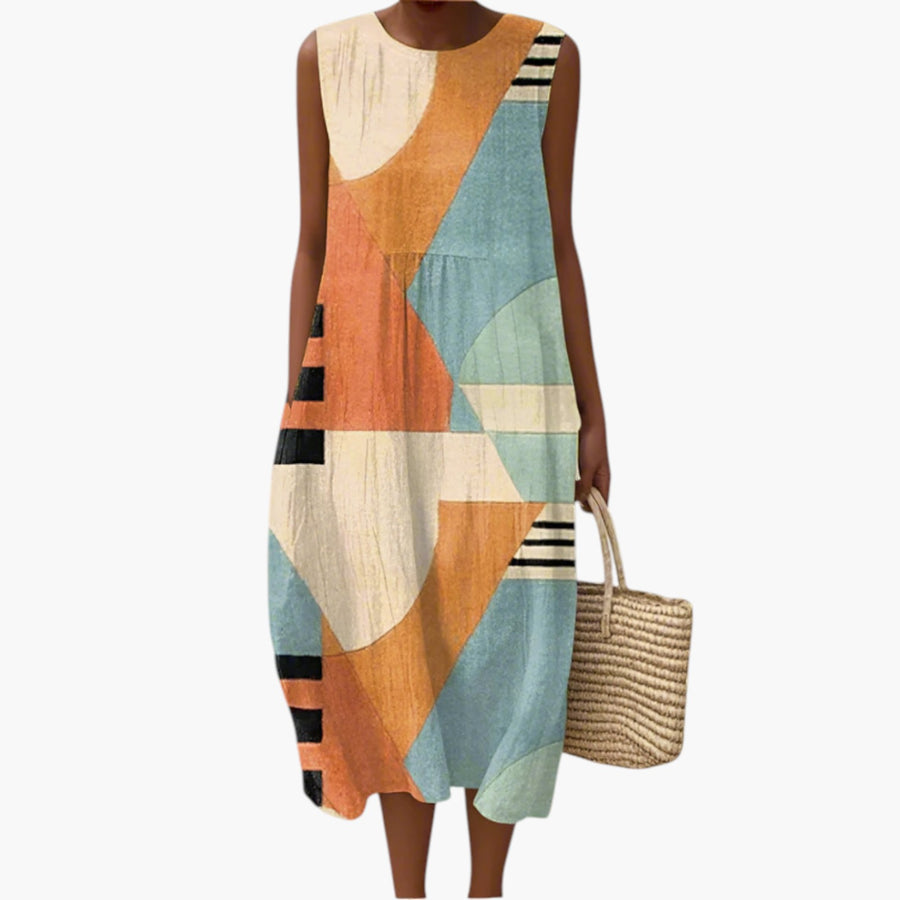 My Store 4 Iris mouwloze midi-jurk met kleurrijk geometrisch patroon op een strand