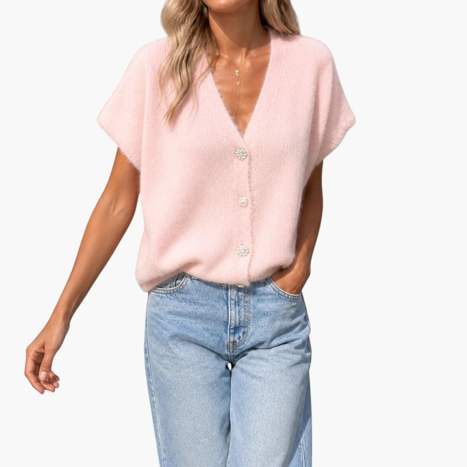 My Store 4 roze wollen vest met V-hals en korte mouwen gedragen met een jeans